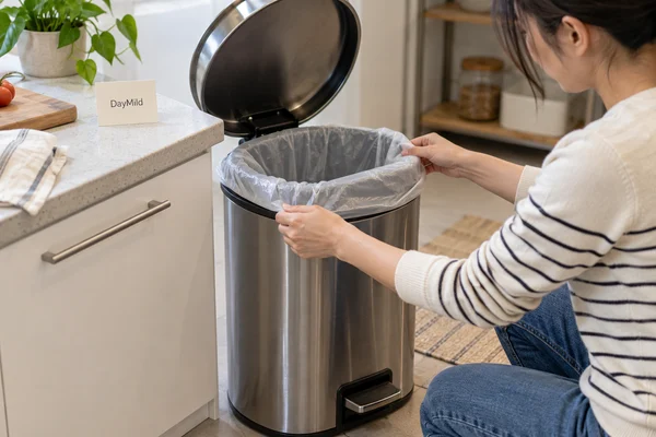 Illustrative DayMild kitchen trash bags household application sample